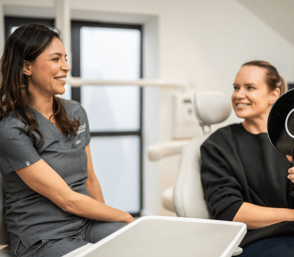 Dentist consulting with a patient at Wellwood Dentistry